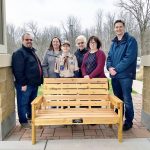 Cub Scout donates bench to PP Library