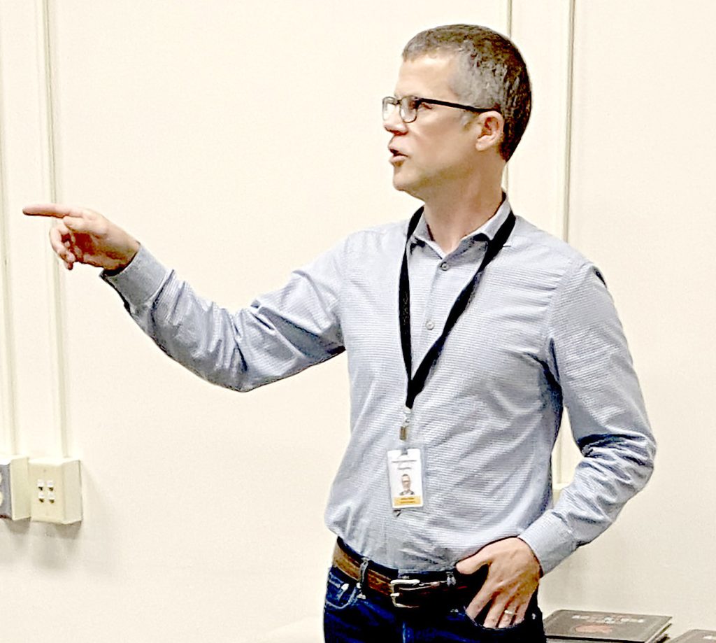 Superintendent Art Ebert reviews a slide-show summary of the food service improvement plan. (Photo by Dennis Volkert)