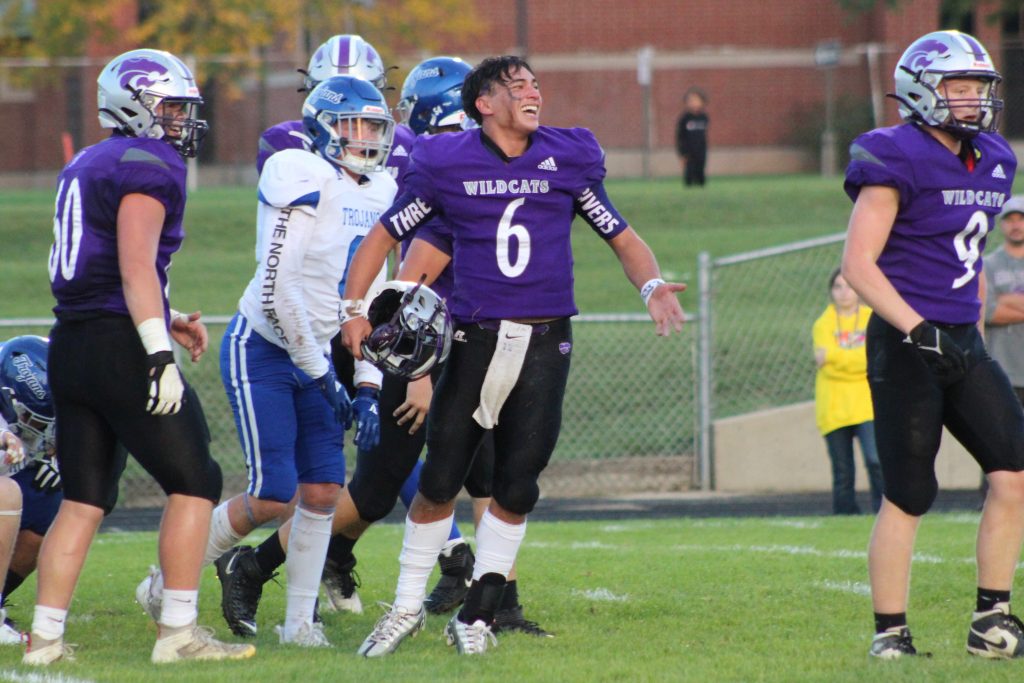 Three Rivers senior quarterback/wide receiver Luis Warmack (6) celebrates after one of his two touchdown rushes in the first quarter during Friday’s 39-0 Homecoming win for the Wildcats over Plainwell.