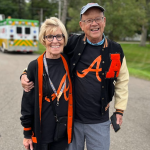 Local couple lead homecoming parade